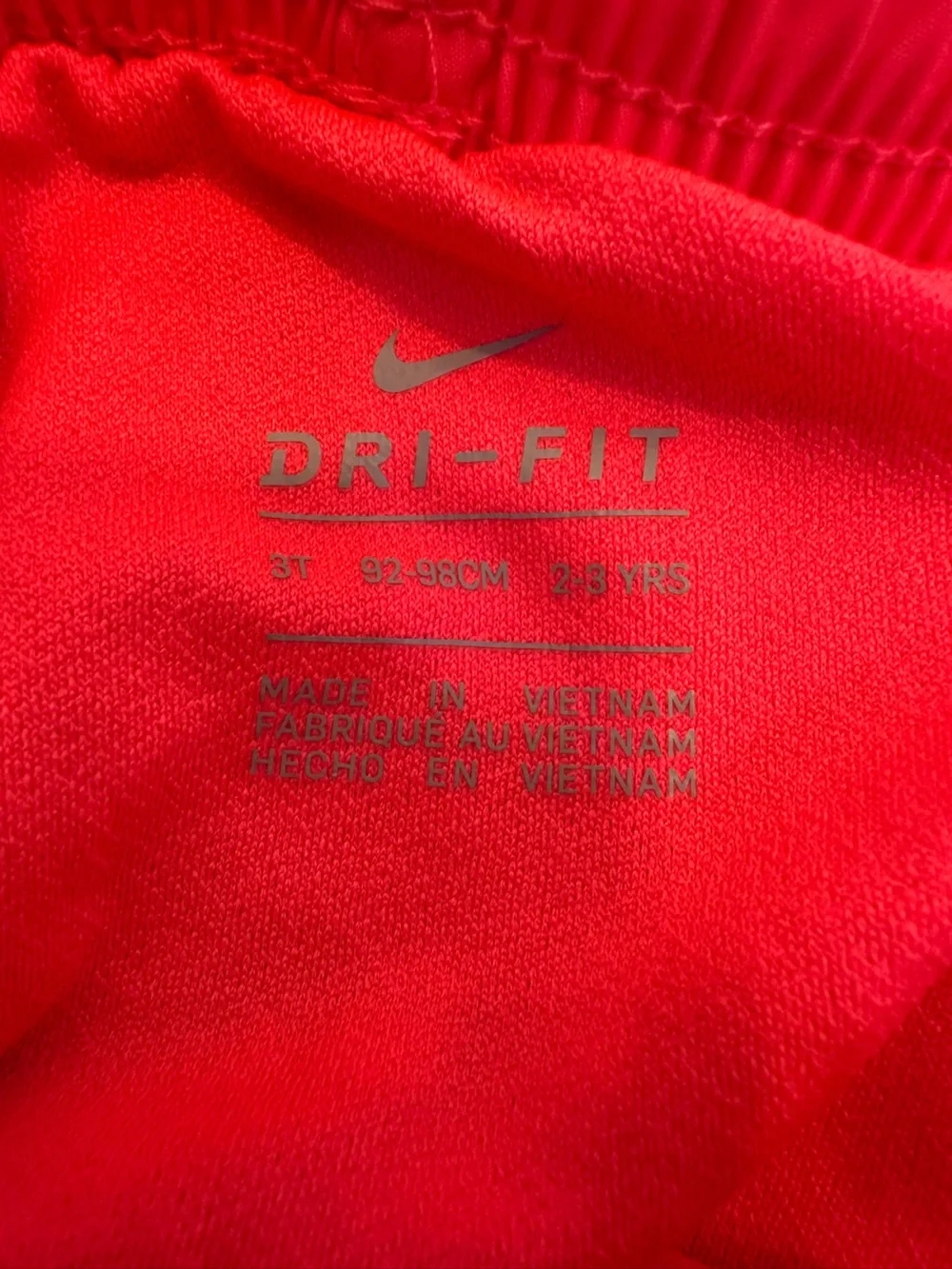 Nike kid's Coral-Pink Athletic Shorts with Black & White Trim